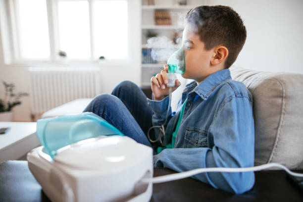 Photo of boy is inhalating at home